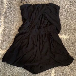 Flattering black strapless romper with pockets